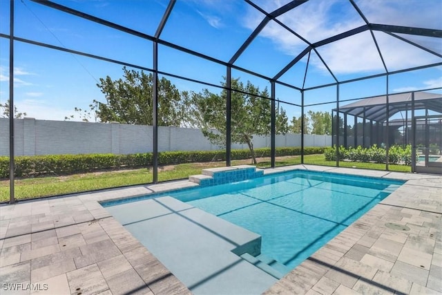 3652 Sapphire Cove Cir, Naples, FL 34114 - view of swimming pool with a patio, a fenced backyard, and glass enclosure