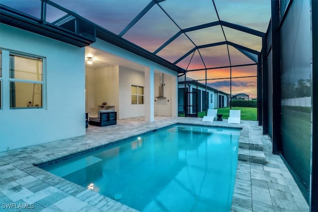 3652 Sapphire Cove Cir, Naples, FL 34114 - swimming pool with a patio and glass enclosure