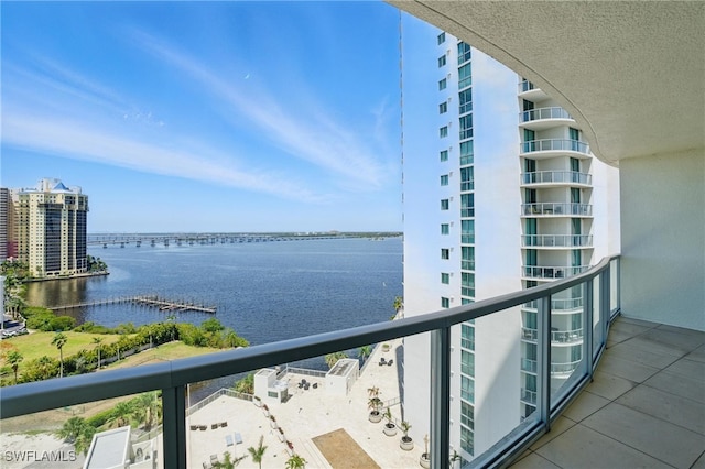 balcony featuring a water view