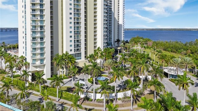 view of apartment building / complex with a water view