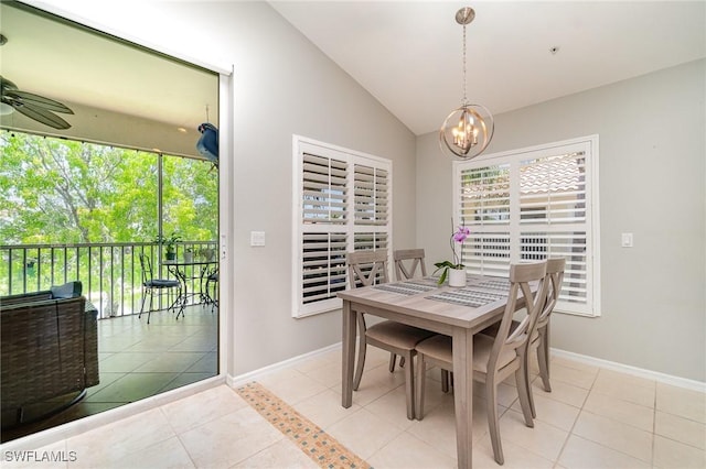 1430 Tiffany Ln Unit 2701, Naples, FL 34105 - dining room with vaulted ceiling, baseboards, a chandelier, light tile patterned floors, and ceiling fan