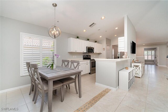 1430 Tiffany Ln Unit 2701, Naples, FL 34105 - dining space featuring a chandelier, baseboards, light tile patterned floors, lofted ceiling, and recessed lighting