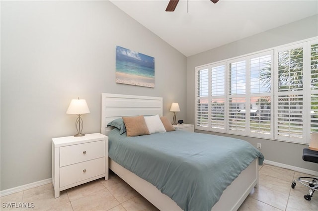 1430 Tiffany Ln Unit 2701, Naples, FL 34105 - bedroom featuring vaulted ceiling, multiple windows, baseboards, and light tile patterned flooring
