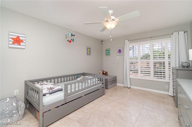 1430 Tiffany Ln Unit 2701, Naples, FL 34105 - bedroom featuring ceiling fan, baseboards, and light tile patterned floors