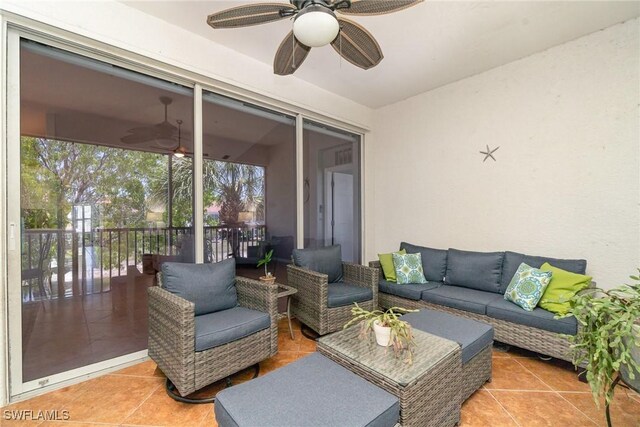 1430 Tiffany Ln Unit 2701, Naples, FL 34105 - view of patio / terrace with a ceiling fan and outdoor lounge area