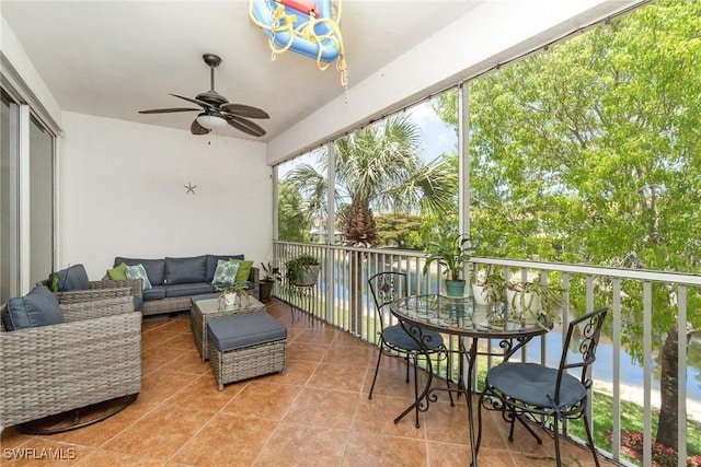 1430 Tiffany Ln Unit 2701, Naples, FL 34105 - balcony with ceiling fan and outdoor lounge area