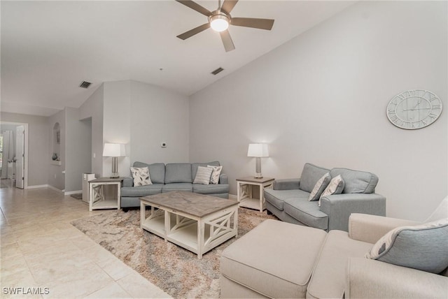 1430 Tiffany Ln Unit 2701, Naples, FL 34105 - living room featuring lofted ceiling, a ceiling fan, light tile patterned flooring, and baseboards
