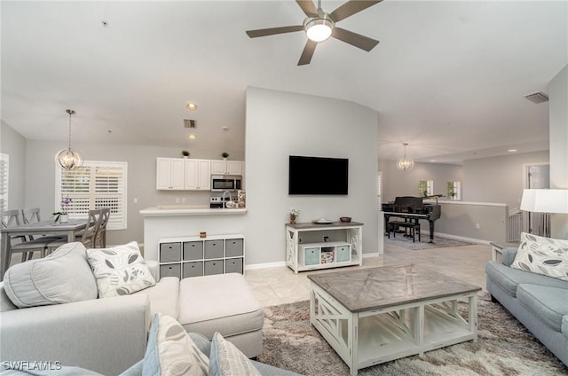 1430 Tiffany Ln Unit 2701, Naples, FL 34105 - living room with a ceiling fan, a chandelier, baseboards, recessed lighting, and light tile patterned flooring