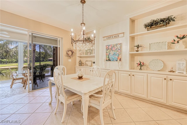 8804 Middlebrook Dr Unit 102, Fort Myers, FL 33908 - dining room featuring light tile patterned floors, a chandelier, and built in shelves