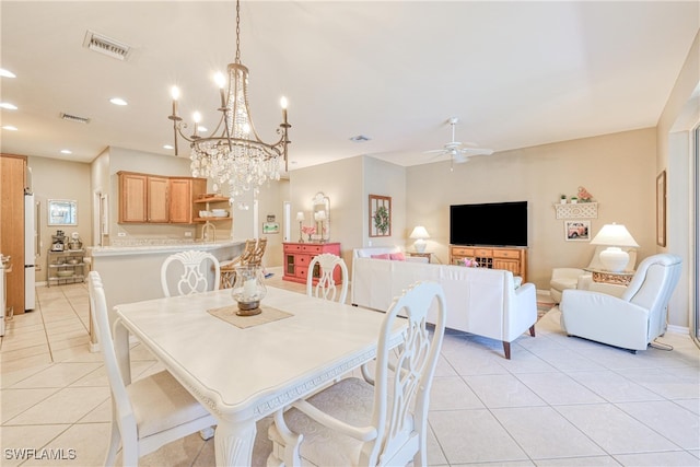 8804 Middlebrook Dr Unit 102, Fort Myers, FL 33908 - dining space featuring light tile patterned floors, ceiling fan, recessed lighting, and a chandelier