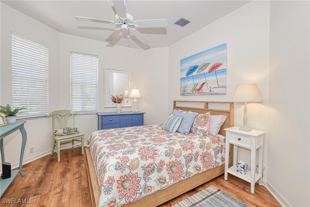 8804 Middlebrook Dr Unit 102, Fort Myers, FL 33908 - bedroom featuring wood finished floors, baseboards, and ceiling fan