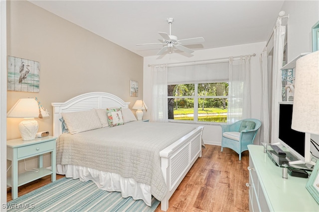 8804 Middlebrook Dr Unit 102, Fort Myers, FL 33908 - bedroom with wood finished floors and a ceiling fan
