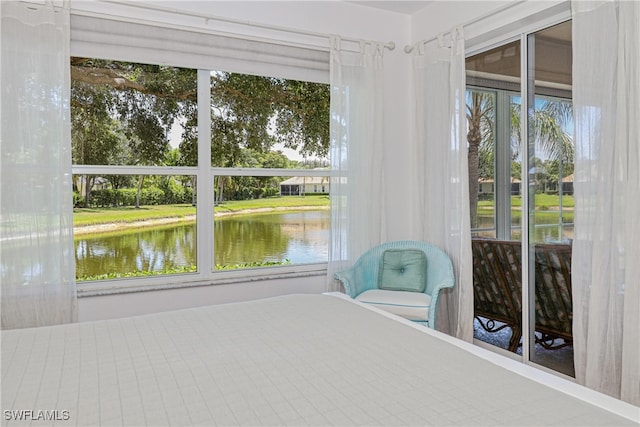 8804 Middlebrook Dr Unit 102, Fort Myers, FL 33908 - bedroom with access to exterior and a water view