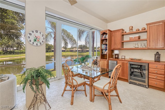 8804 Middlebrook Dr Unit 102, Fort Myers, FL 33908 - dining room with wine cooler and a water view