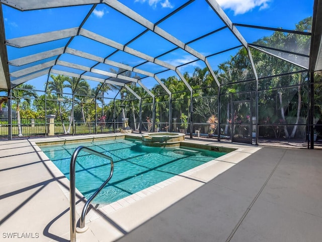 5667 Winkler Rd, Fort Myers, FL 33919 - view of swimming pool with a patio area, a pool with connected hot tub, and glass enclosure