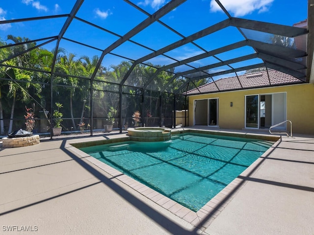 5667 Winkler Rd, Fort Myers, FL 33919 - view of pool featuring a patio, a pool with connected hot tub, a lanai, and an outdoor fire pit