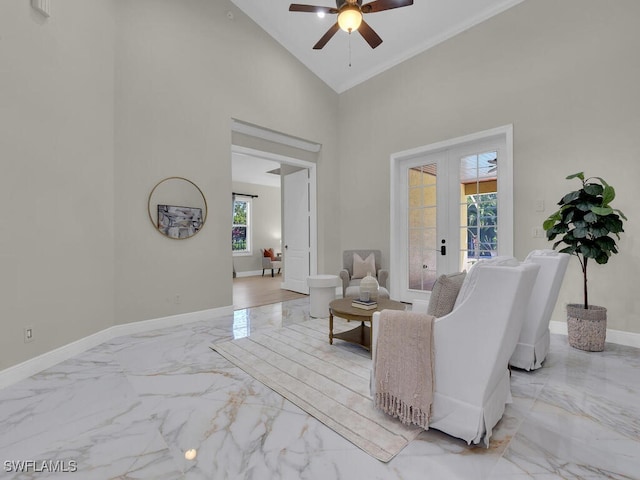 5667 Winkler Rd, Fort Myers, FL 33919 - living area featuring light marble finish flooring, a ceiling fan, french doors, baseboards, and high vaulted ceiling
