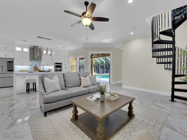 5667 Winkler Rd, Fort Myers, FL 33919 - living room featuring light marble finish flooring, a ceiling fan, recessed lighting, stairway, and ornamental molding