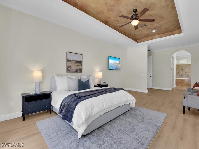 5667 Winkler Rd, Fort Myers, FL 33919 - bedroom with a tray ceiling, light wood-style flooring, and baseboards