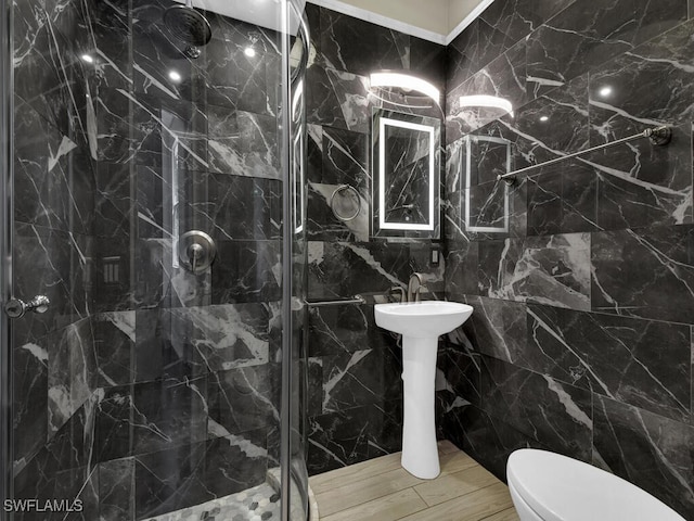 5667 Winkler Rd, Fort Myers, FL 33919 - bathroom featuring tile walls, a shower stall, toilet, and wood finished floors