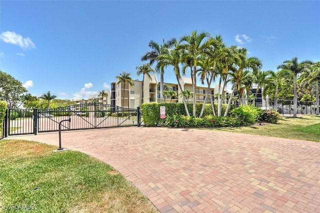 929 Collier Ct Unit B401, Marco Island, FL 34145 - view of home's community with a gate