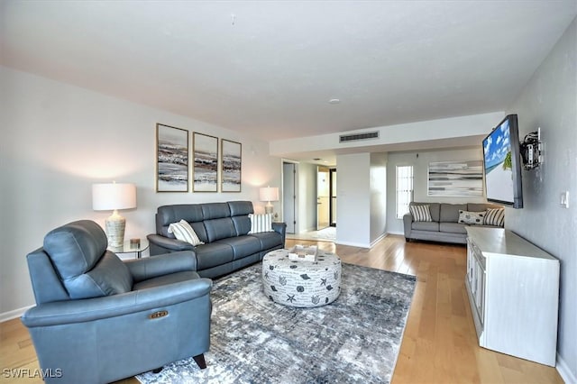 929 Collier Ct Unit B401, Marco Island, FL 34145 - living room with light wood-style flooring and baseboards