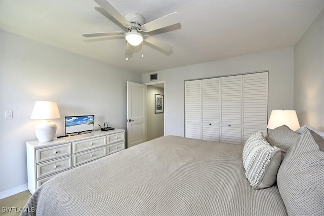 929 Collier Ct Unit B401, Marco Island, FL 34145 - bedroom with a closet, ceiling fan, and baseboards