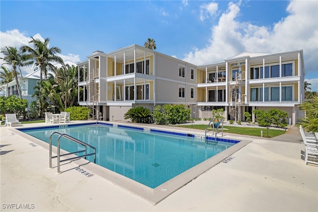11410 Old Lodge Ln Unit 2C, Captiva, FL 33924 - community pool featuring stairway