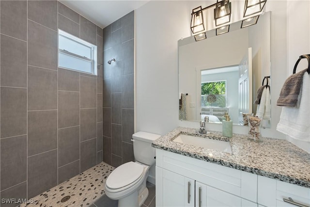 5205/5207 26th St SW, Lehigh Acres, FL 33973 - full bath featuring tiled shower, plenty of natural light, and vanity