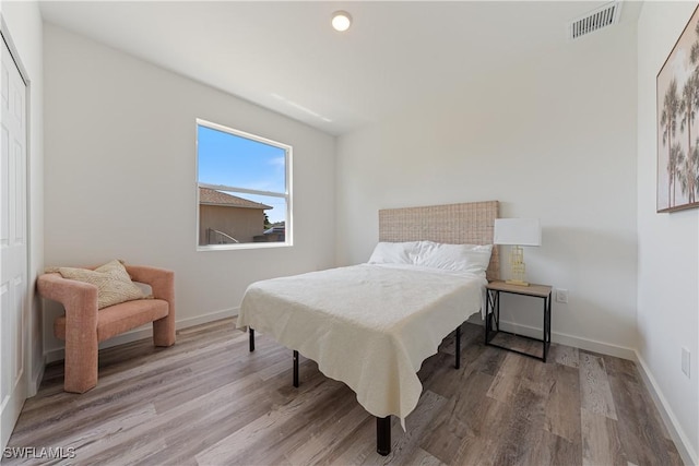 5205/5207 26th St SW, Lehigh Acres, FL 33973 - bedroom with wood finished floors and baseboards