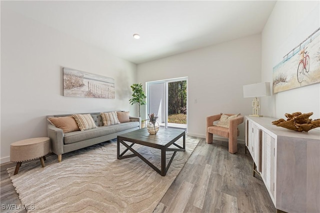 5205/5207 26th St SW, Lehigh Acres, FL 33973 - living room featuring wood finished floors and baseboards
