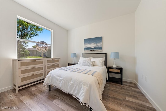 5205/5207 26th St SW, Lehigh Acres, FL 33973 - bedroom with wood finished floors and baseboards