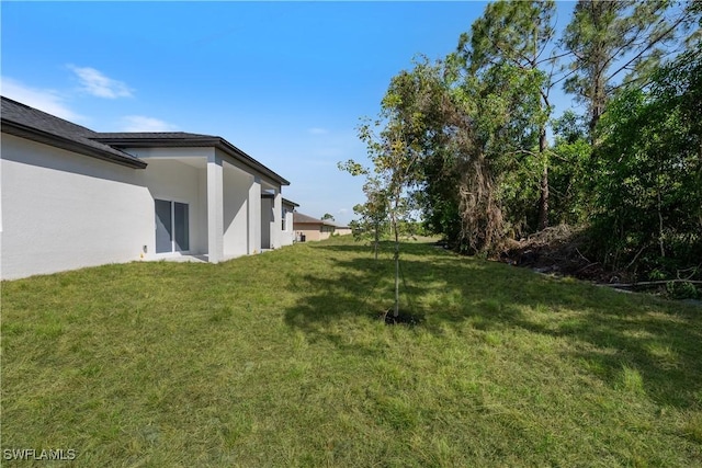 5205/5207 26th St SW, Lehigh Acres, FL 33973 - view of green lawn