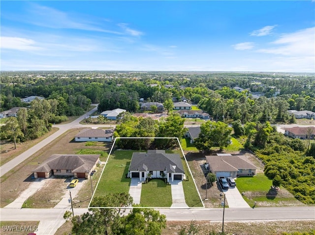 5205/5207 26th St SW, Lehigh Acres, FL 33973 - aerial view of residential area featuring property parcel outlined