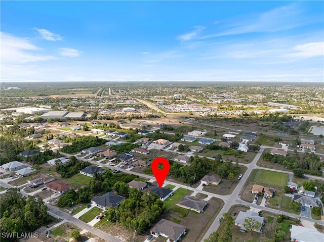 5205/5207 26th St SW, Lehigh Acres, FL 33973 - aerial overview of property's location featuring nearby suburban area