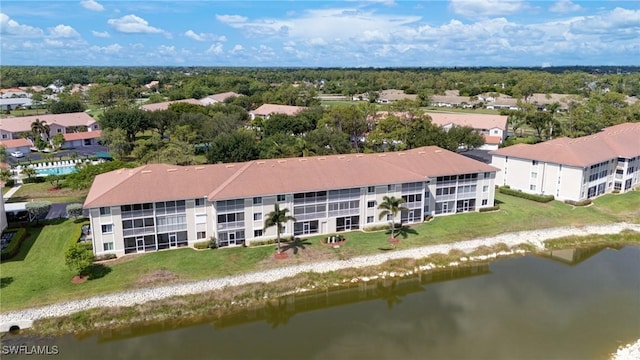 7065 Dennis Cir Unit F204, Naples, FL 34104 - aerial view of a large body of water and a tree filled landscape