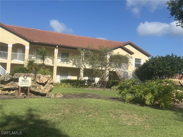 9851 Costa Mesa Ln Unit 308, Bonita Springs, FL 34135 - view of building exterior with stairs