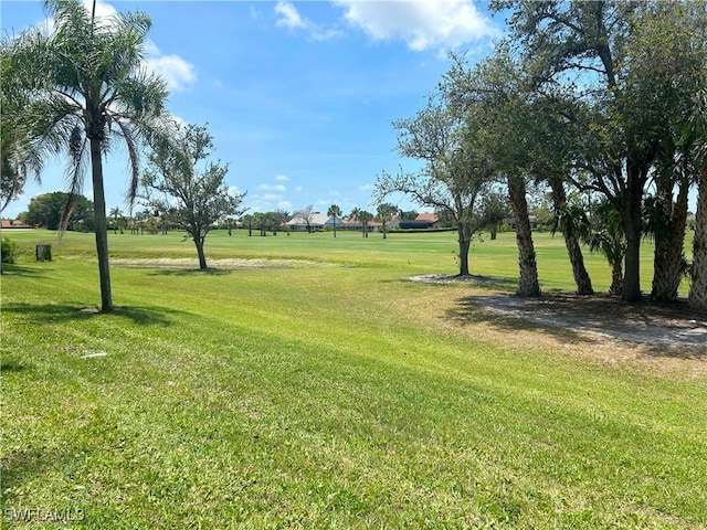 9851 Costa Mesa Ln Unit 308, Bonita Springs, FL 34135 - view of community featuring a yard