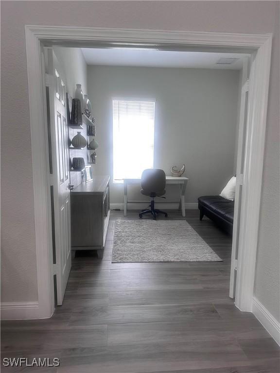5489 Whispering Willow Way, Fort Myers, FL 33908 - office space with baseboards and wood finished floors