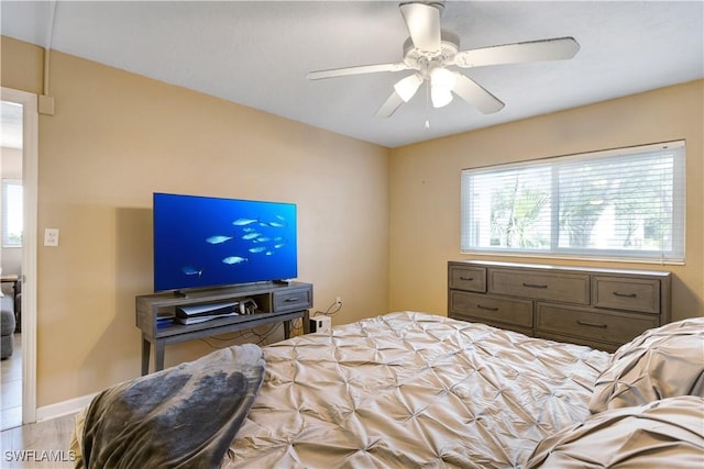 2100 Barkeley Ln Unit 1, Fort Myers, FL 33907 - bedroom featuring multiple windows and ceiling fan