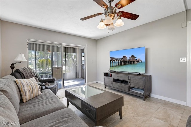 2100 Barkeley Ln Unit 1, Fort Myers, FL 33907 - living area featuring a ceiling fan and baseboards