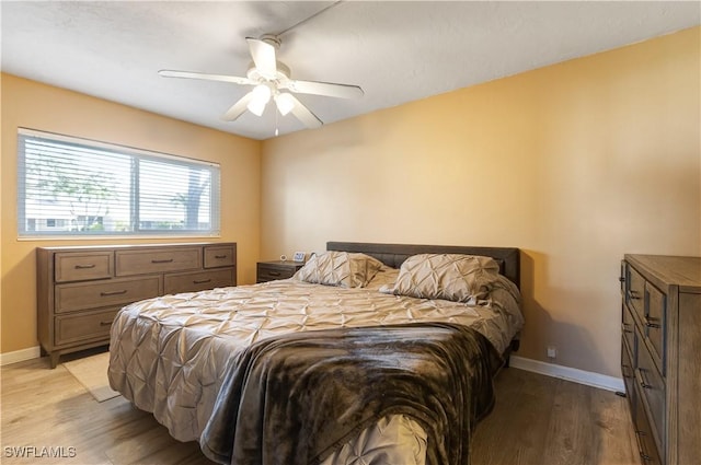 2100 Barkeley Ln Unit 1, Fort Myers, FL 33907 - bedroom featuring light wood finished floors, baseboards, and a ceiling fan
