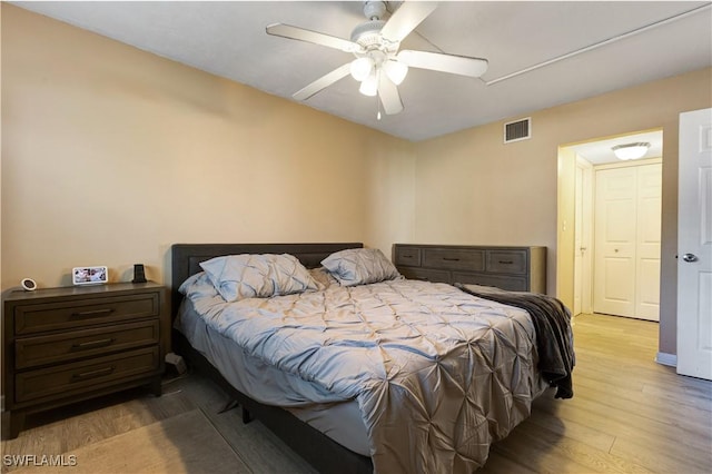 2100 Barkeley Ln Unit 1, Fort Myers, FL 33907 - bedroom featuring attic access, light wood finished floors, and a ceiling fan