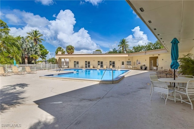 2100 Barkeley Ln Unit 1, Fort Myers, FL 33907 - community pool featuring a patio area