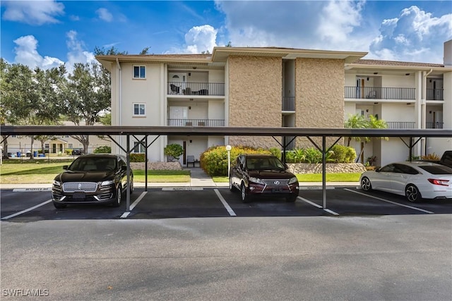 2100 Barkeley Ln Unit 1, Fort Myers, FL 33907 - view of covered parking lot