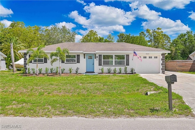 9441 Sedgefield Rd, North Fort Myers, FL 33917 - ranch-style house featuring an attached garage, driveway, and stucco siding