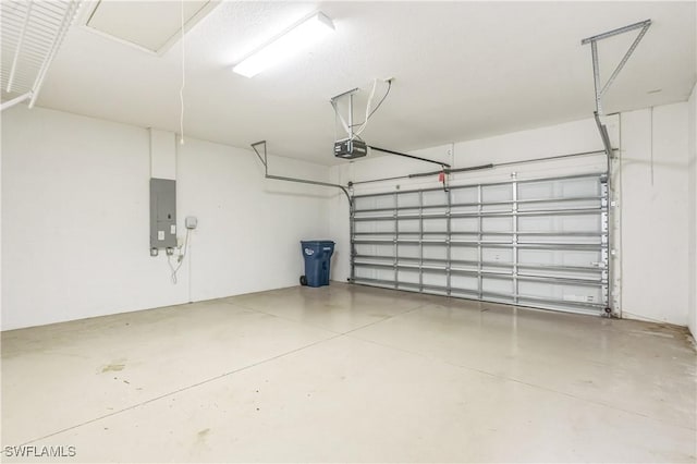 12642 Cara Cara Loop, Bradenton, FL 34212 - garage featuring electric panel and a garage door opener