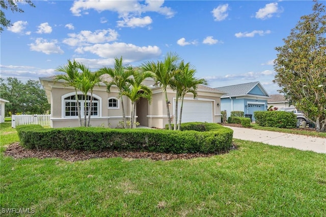 12642 Cara Cara Loop, Bradenton, FL 34212 - view of front of property featuring stucco siding, a garage, and driveway