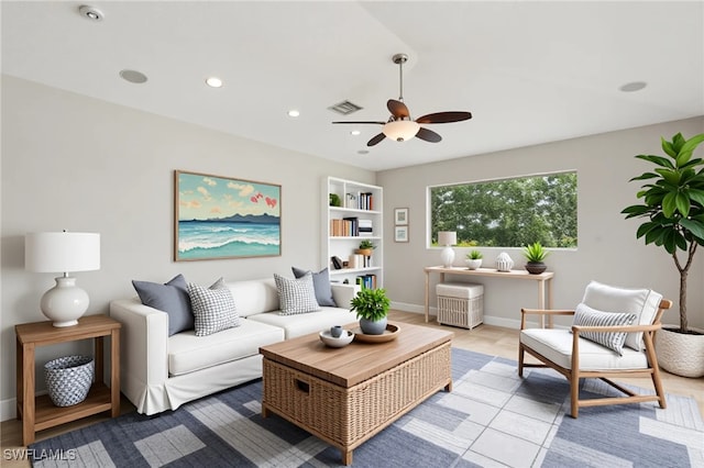 12642 Cara Cara Loop, Bradenton, FL 34212 - living area with a ceiling fan, recessed lighting, built in shelves, and baseboards