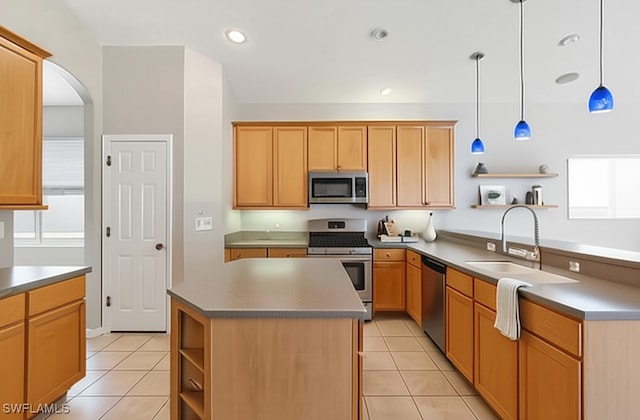 12642 Cara Cara Loop, Bradenton, FL 34212 - kitchen with stainless steel appliances, open shelves, light tile patterned floors, arched walkways, and recessed lighting